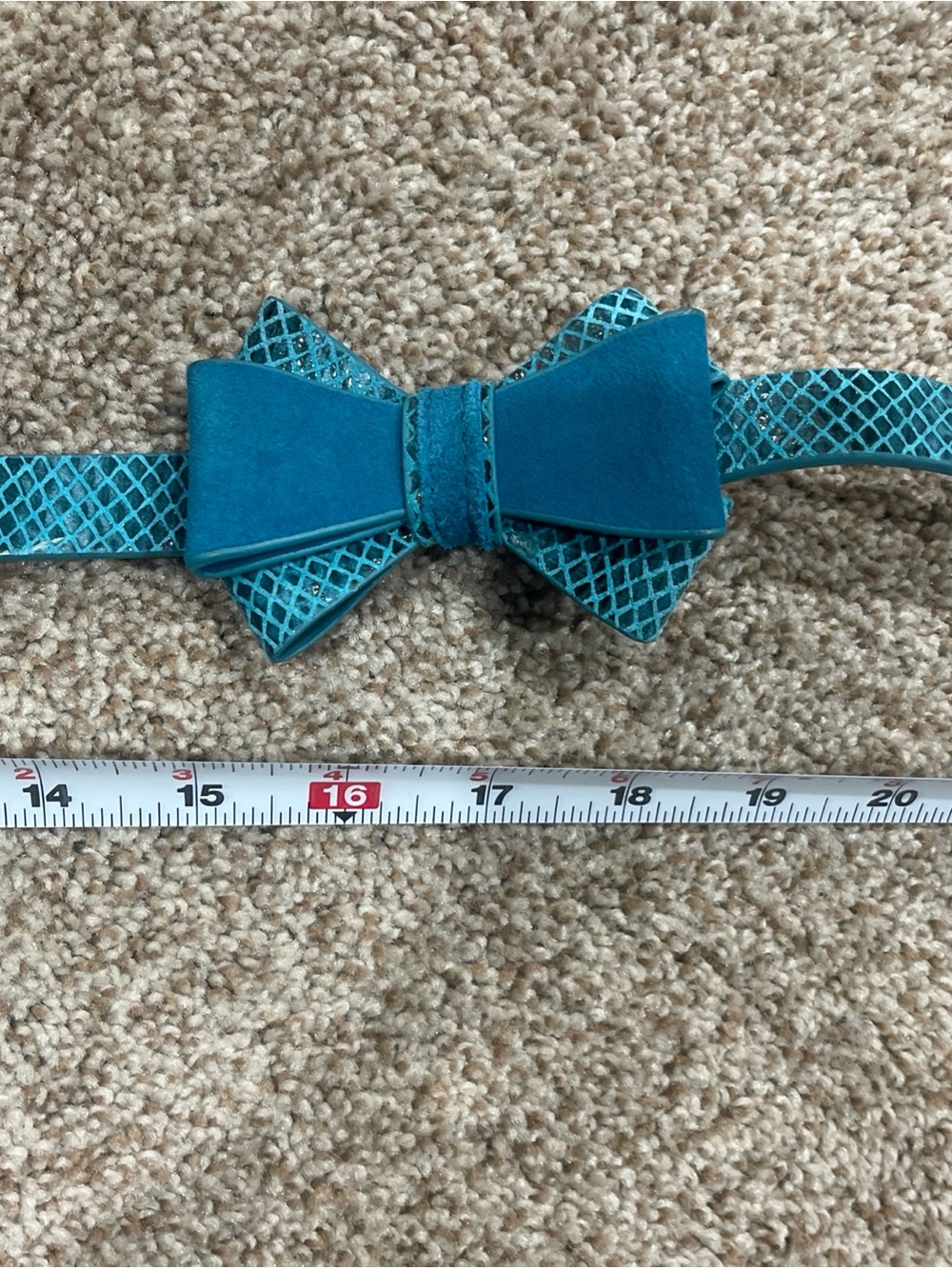 White House Black Market teal snakeskin bow belt